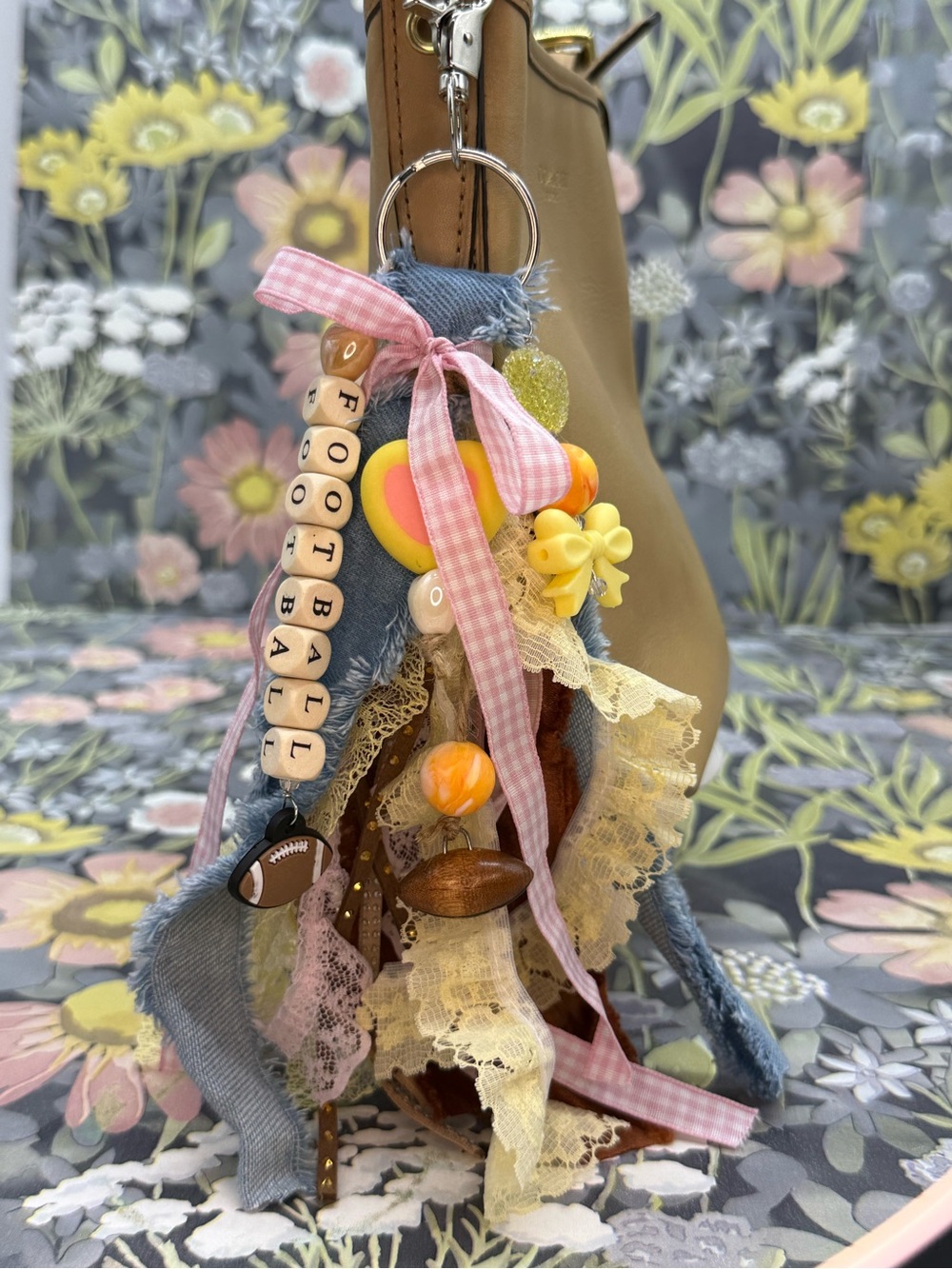Adorned Crown Jewelry purse bag charm keychain football fabric tassel